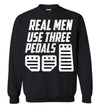 REAL MEN USE THREE PEDALS T-SHIRT